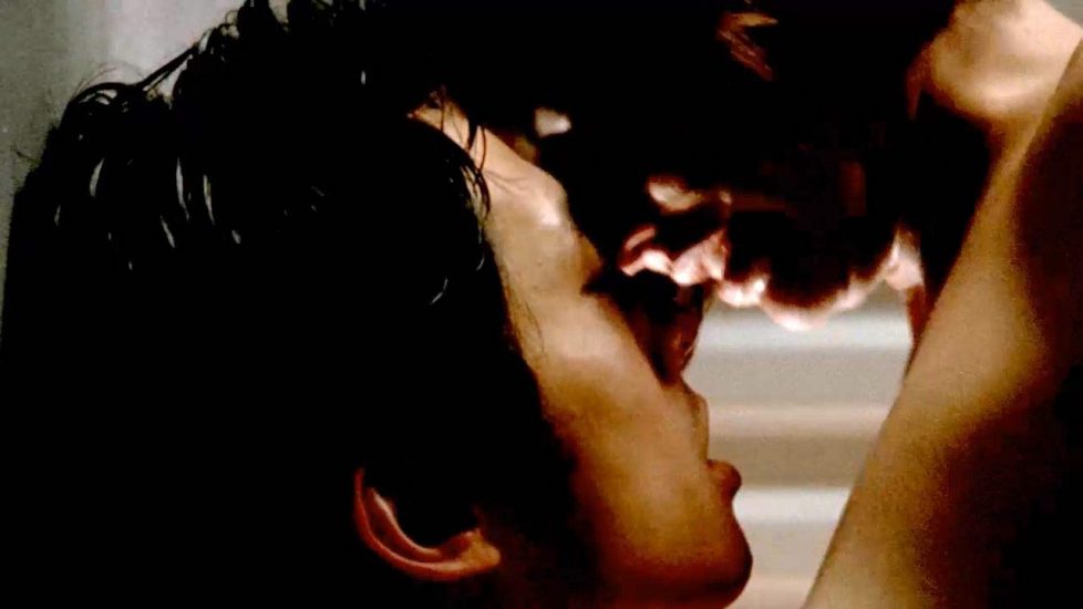 Lauren Cohan kissing with man during sex